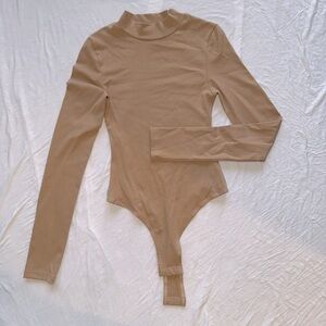 Nude kittenish mock neck bodysuit